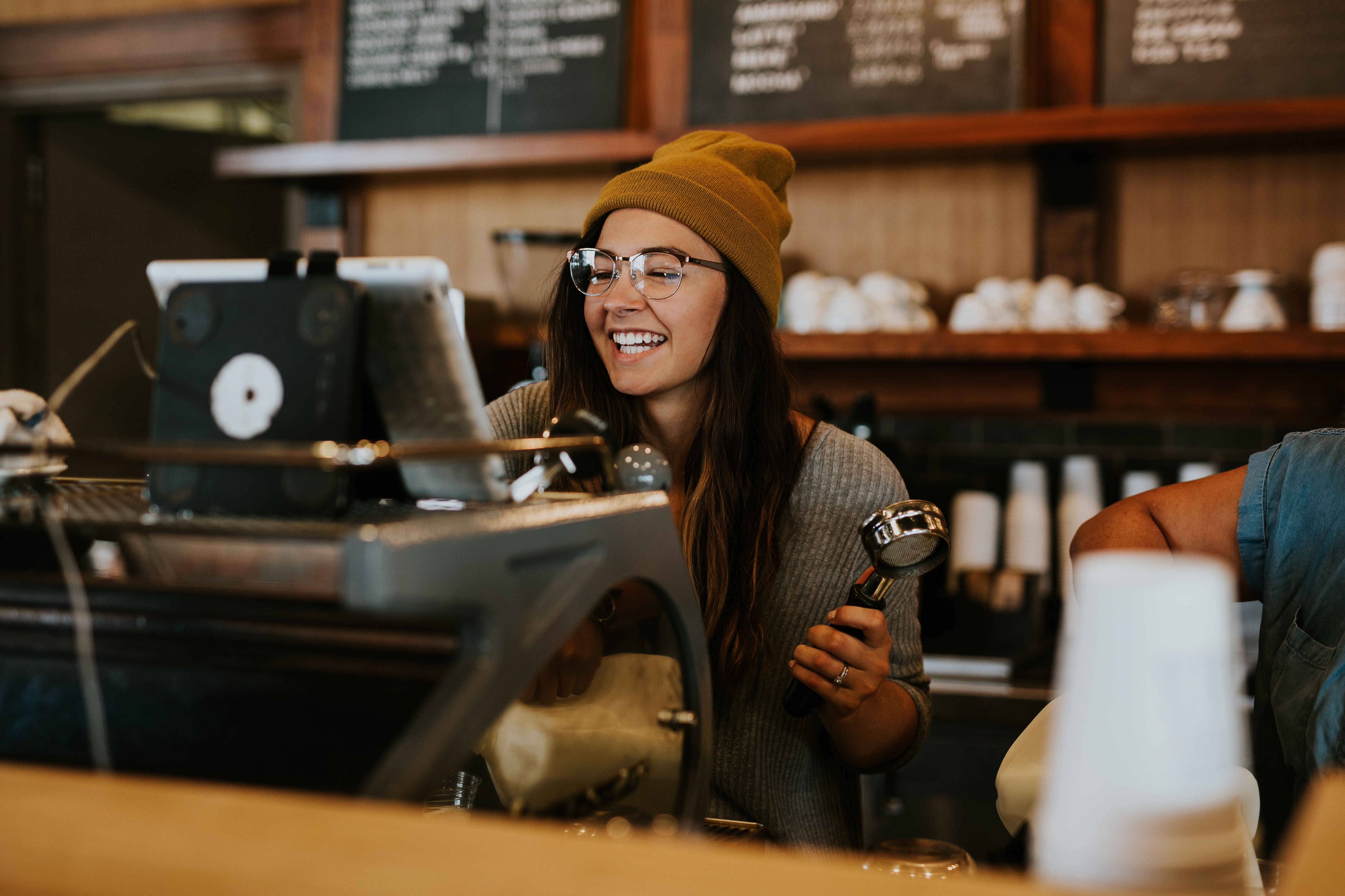 Picture of a woman working at a coffee shop